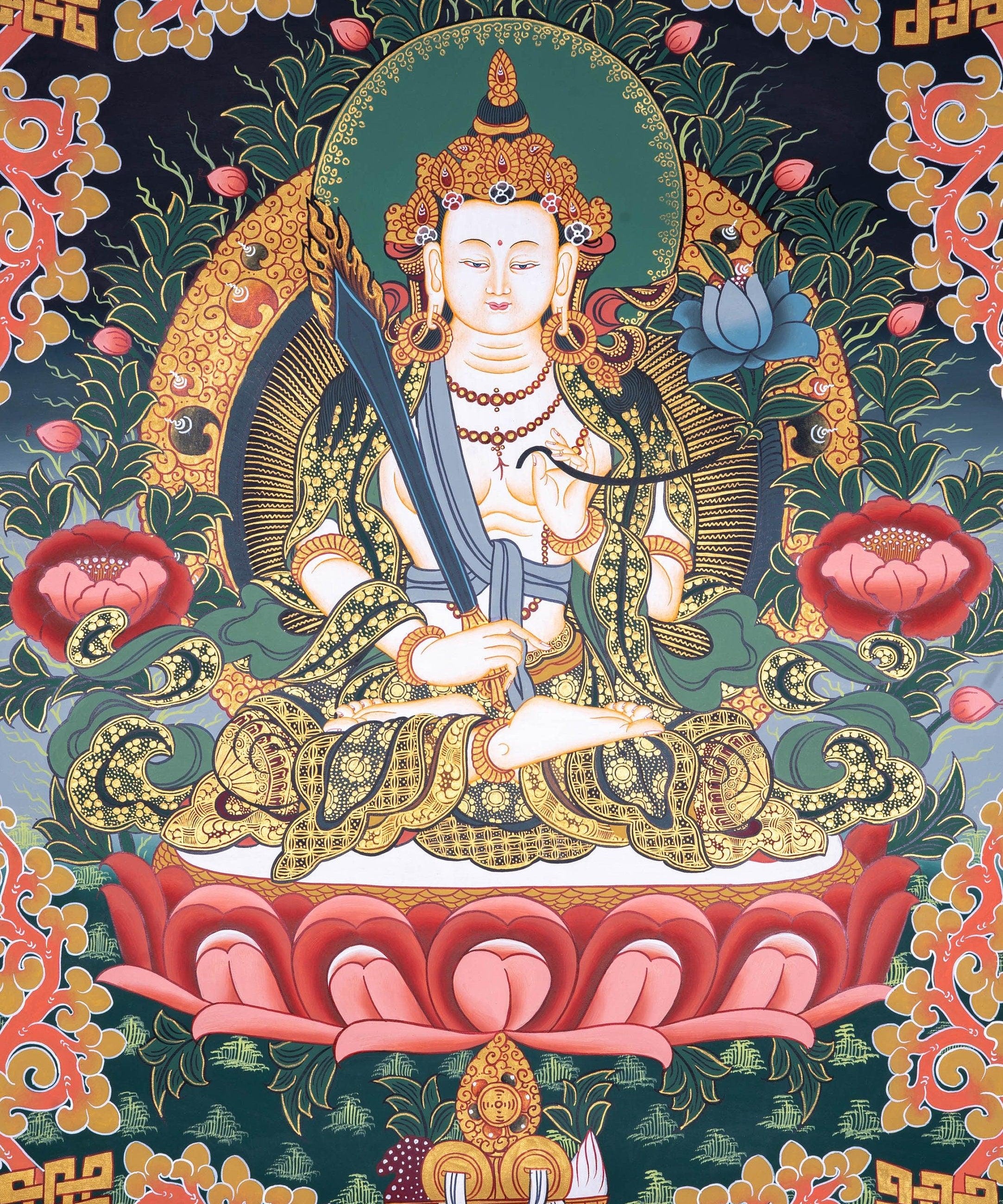 Manjushri Thangka painting in Chinese Art . Buddha of Wisdom and  cutting ignorance with his sword of flames.