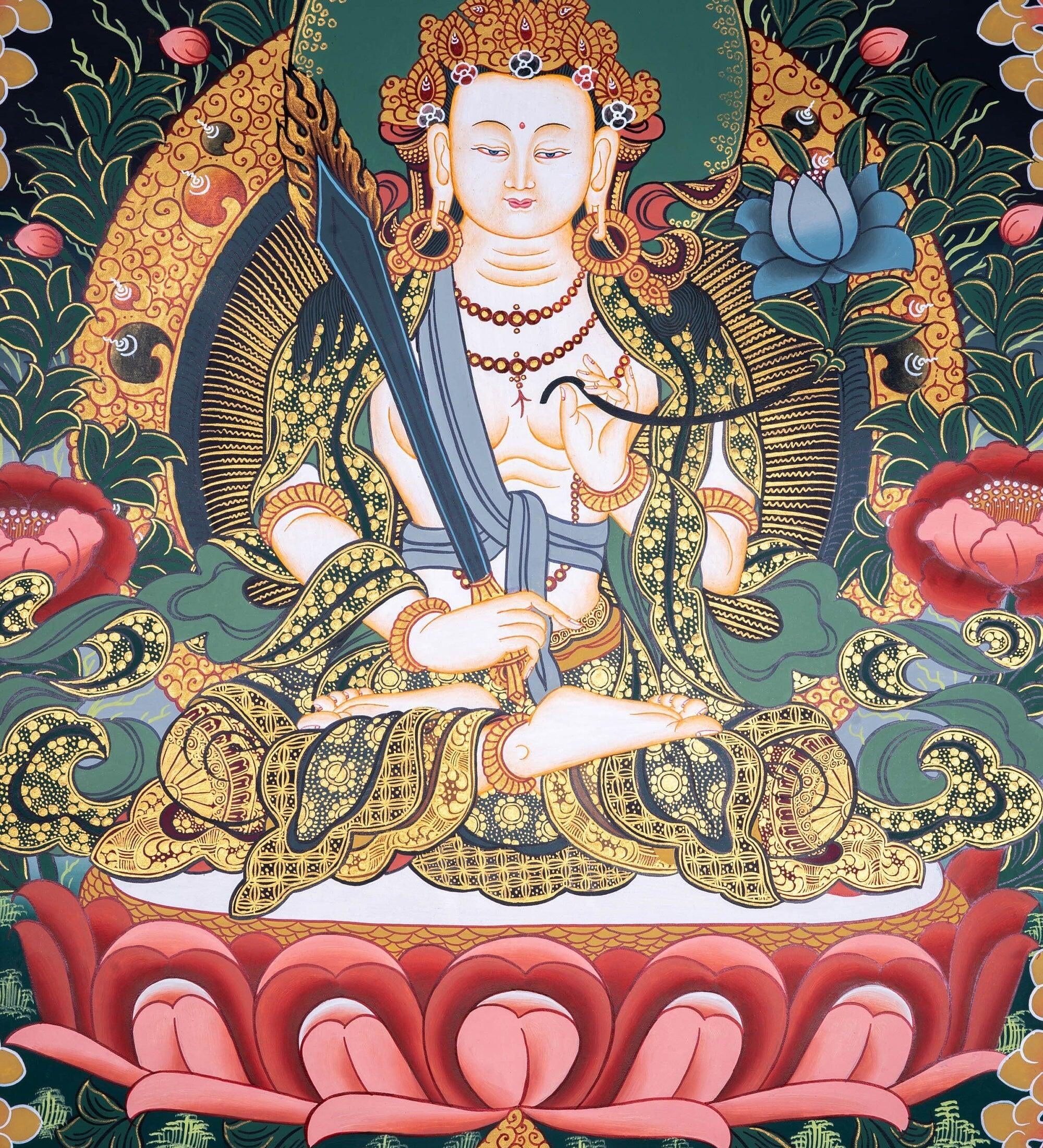 Manjushri Thangka painting in Chinese Art . Buddha of Wisdom and  cutting ignorance with his sword of flames.