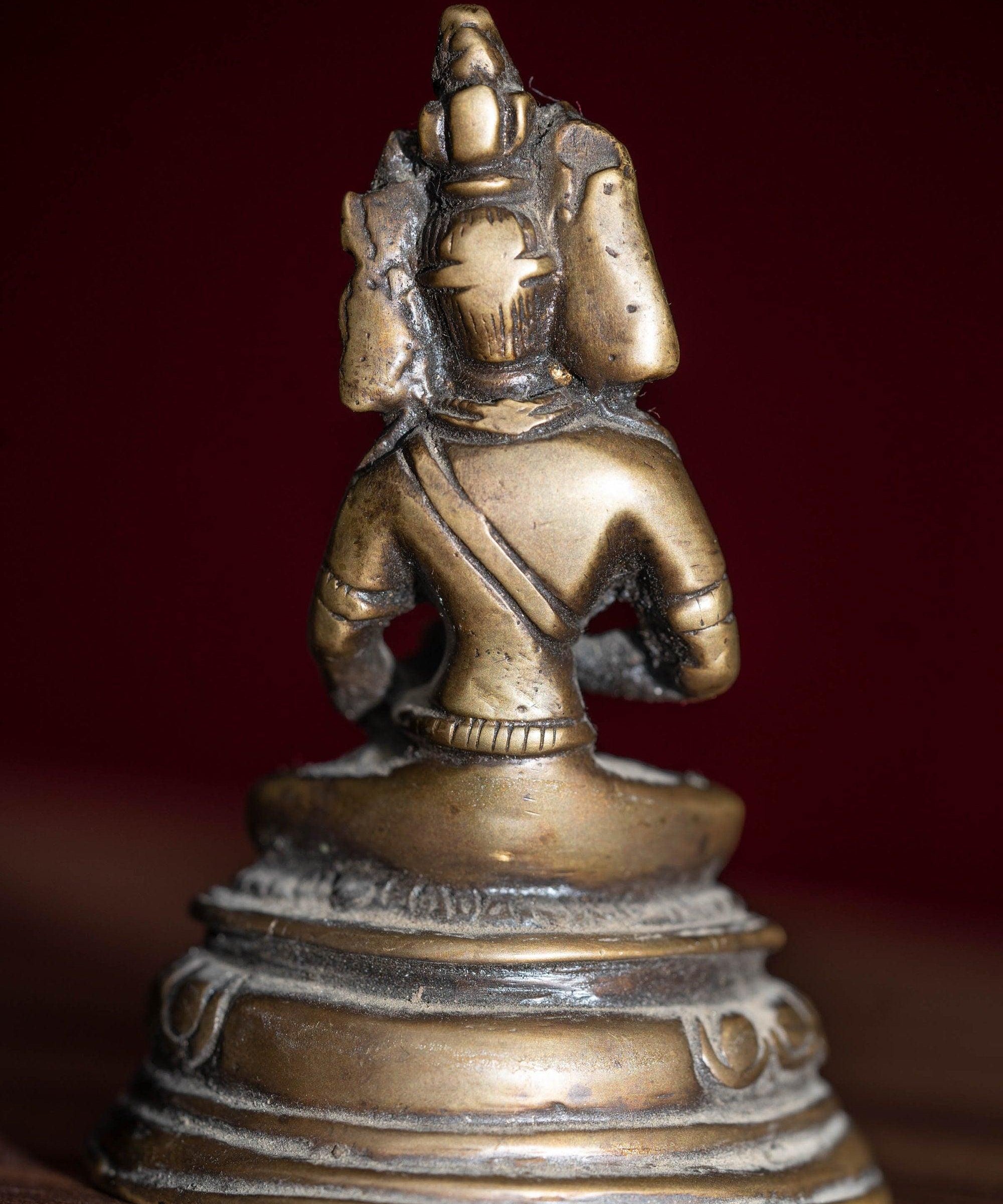 Antique collection piece of Bajrasattwa buddhist deity with detail metal craft workAntique collection piece of Bajrasattwa buddhist deity with detail metal craft work