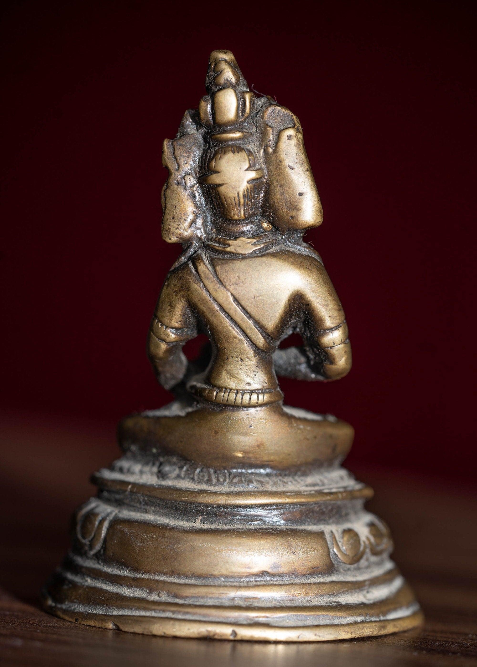 Antique collection piece of Bajrasattwa buddhist deity with detail metal craft workAntique collection piece of Bajrasattwa buddhist deity with detail metal craft work