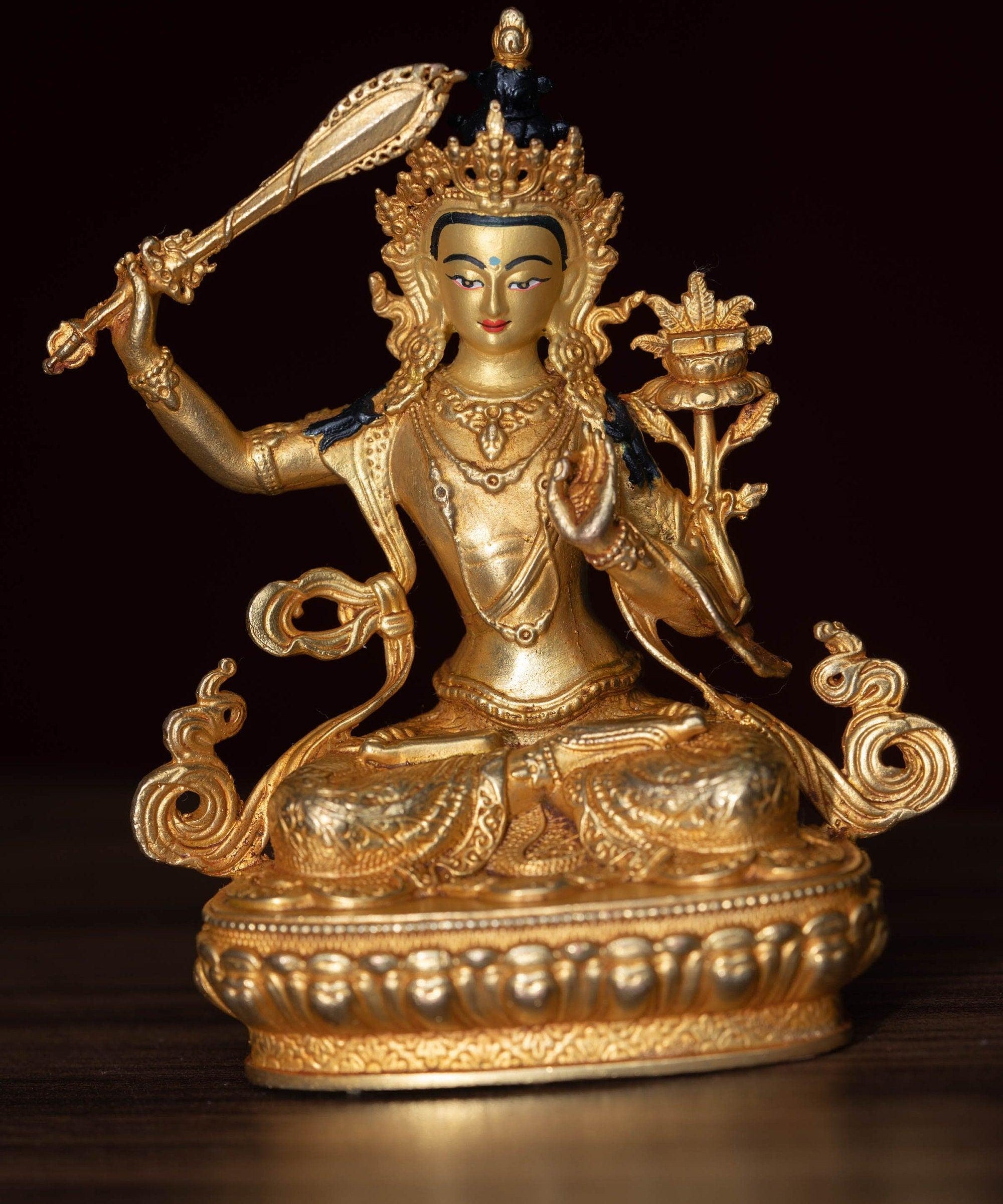 Manjushri Statue gold plated in small size -4 inch.