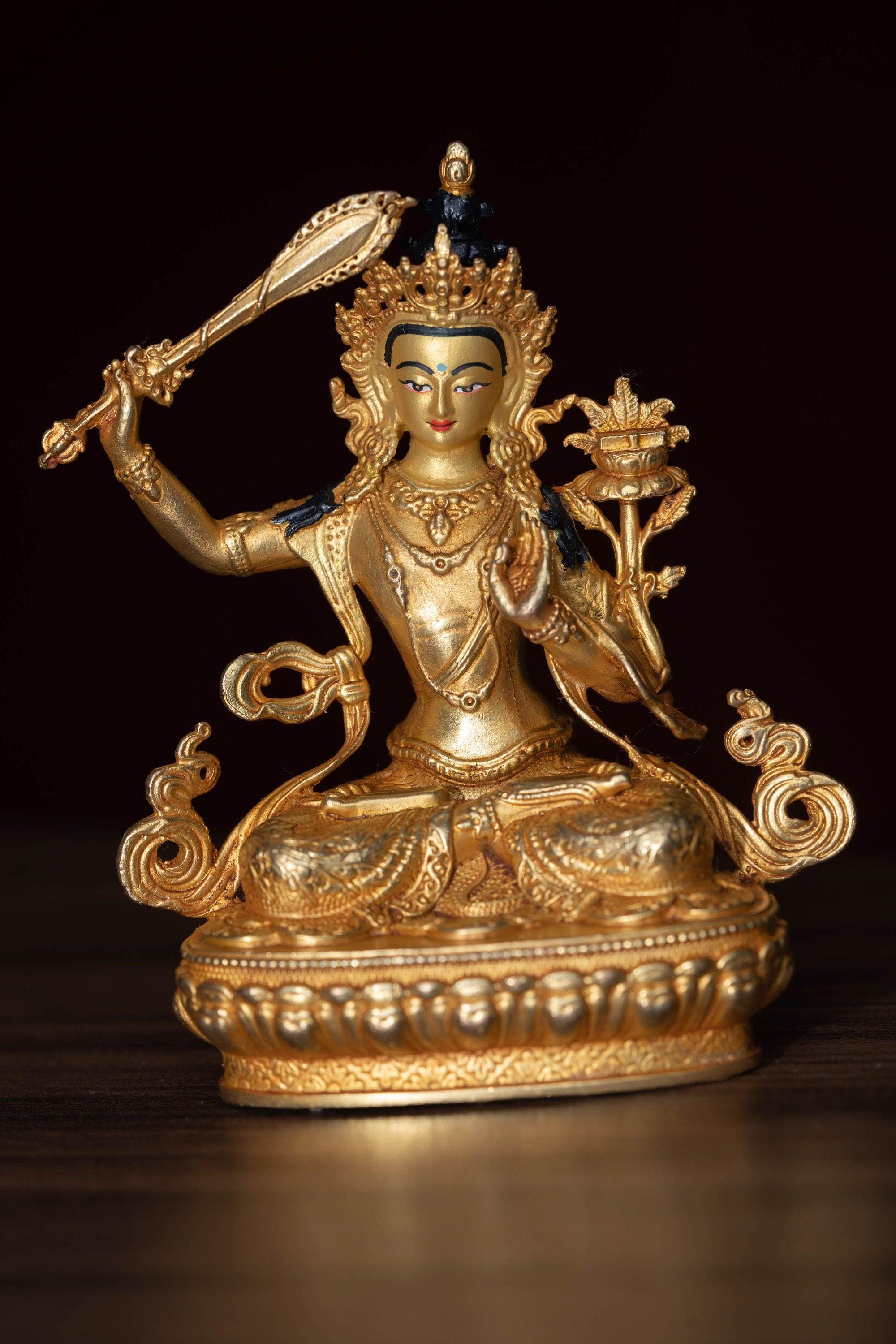 Manjushri Statue gold plated in small size -4 inch.
