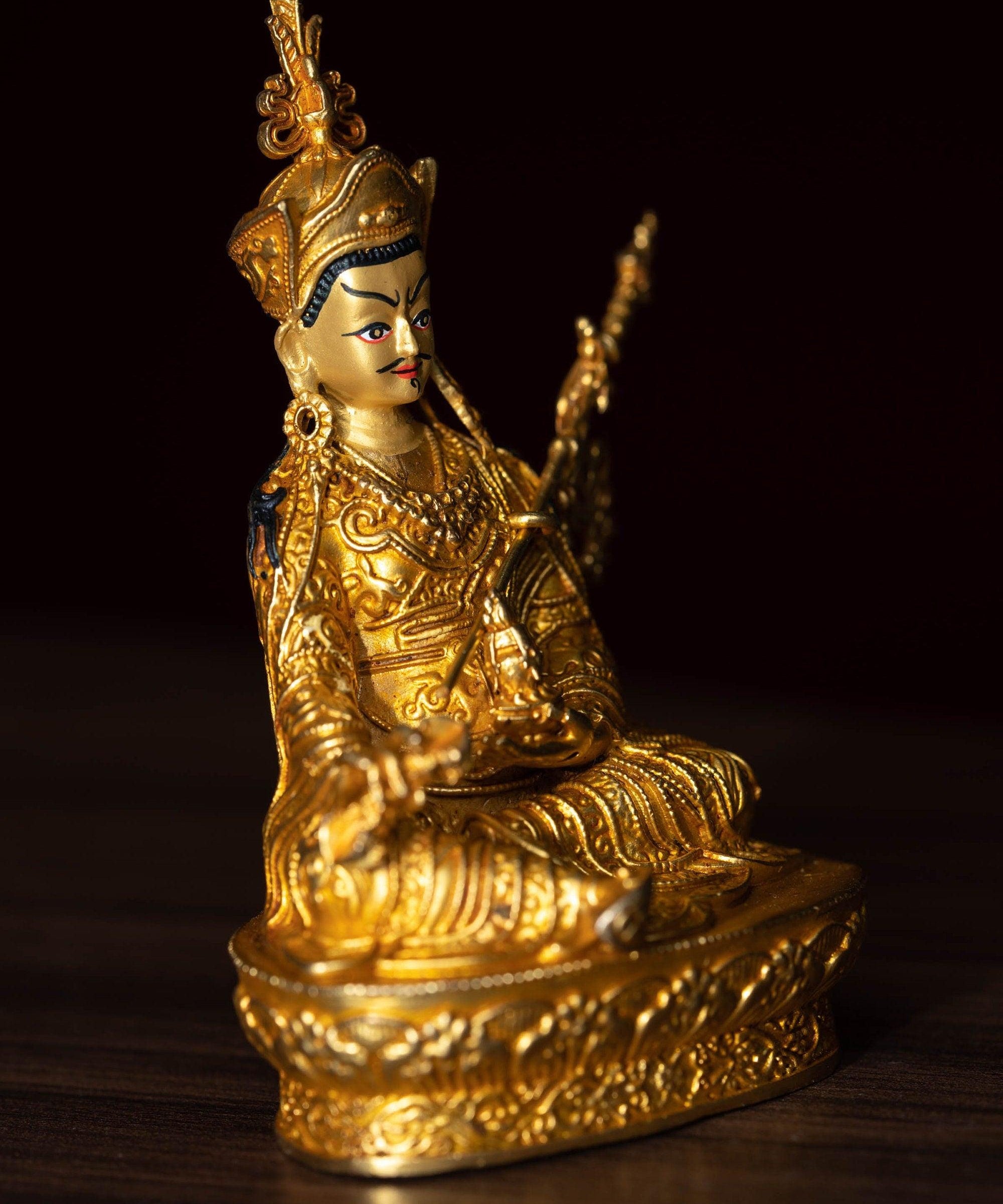 mall size 4 inch Guru Padmasambhava is gold plated on metal.