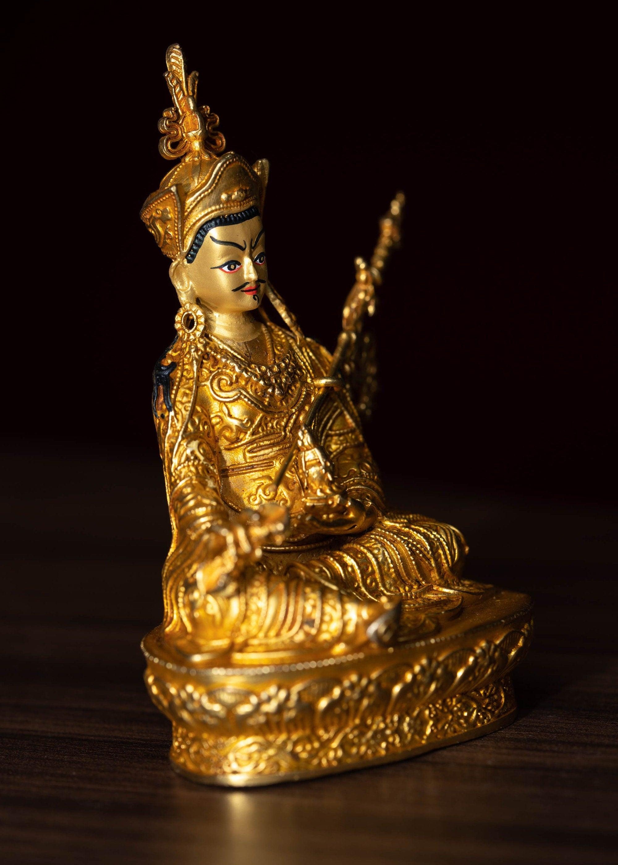 mall size 4 inch Guru Padmasambhava is gold plated on metal.