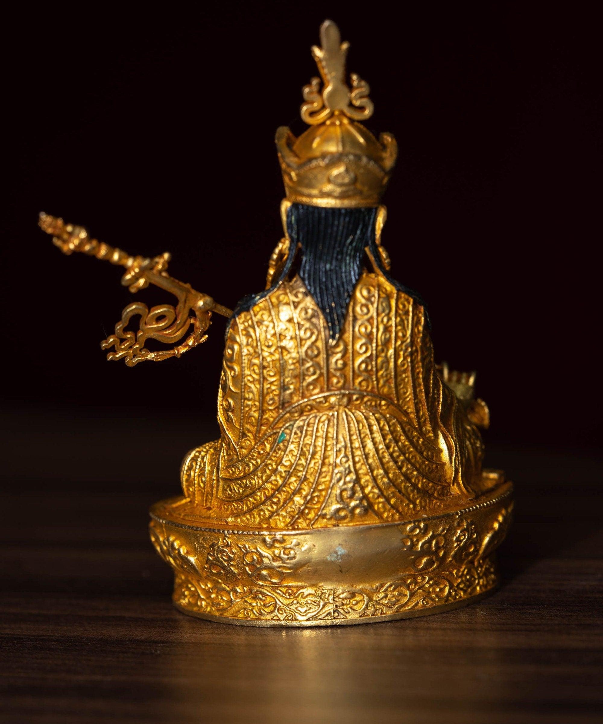 mall size 4 inch Guru Padmasambhava is gold plated on metal.