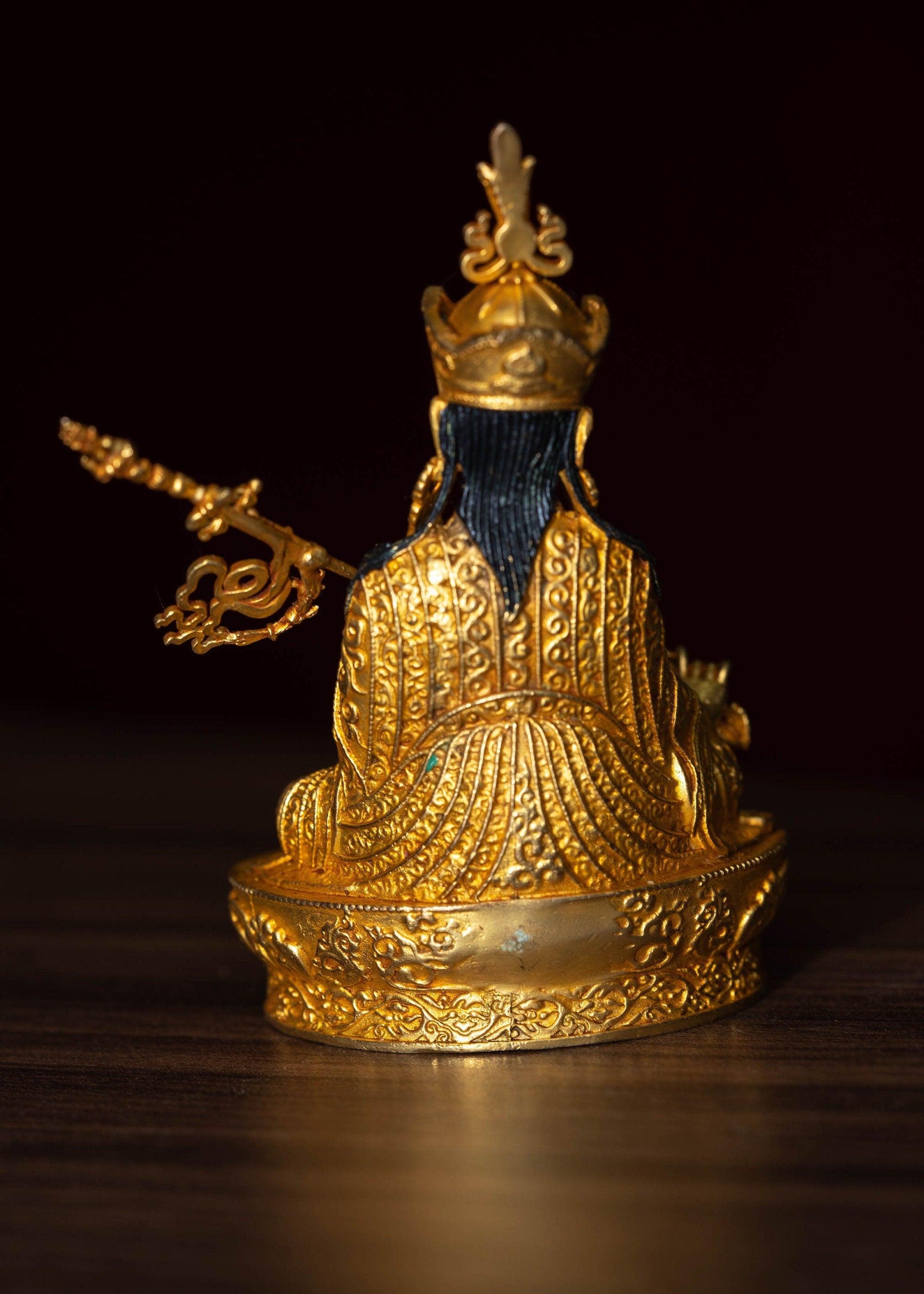 mall size 4 inch Guru Padmasambhava is gold plated on metal.