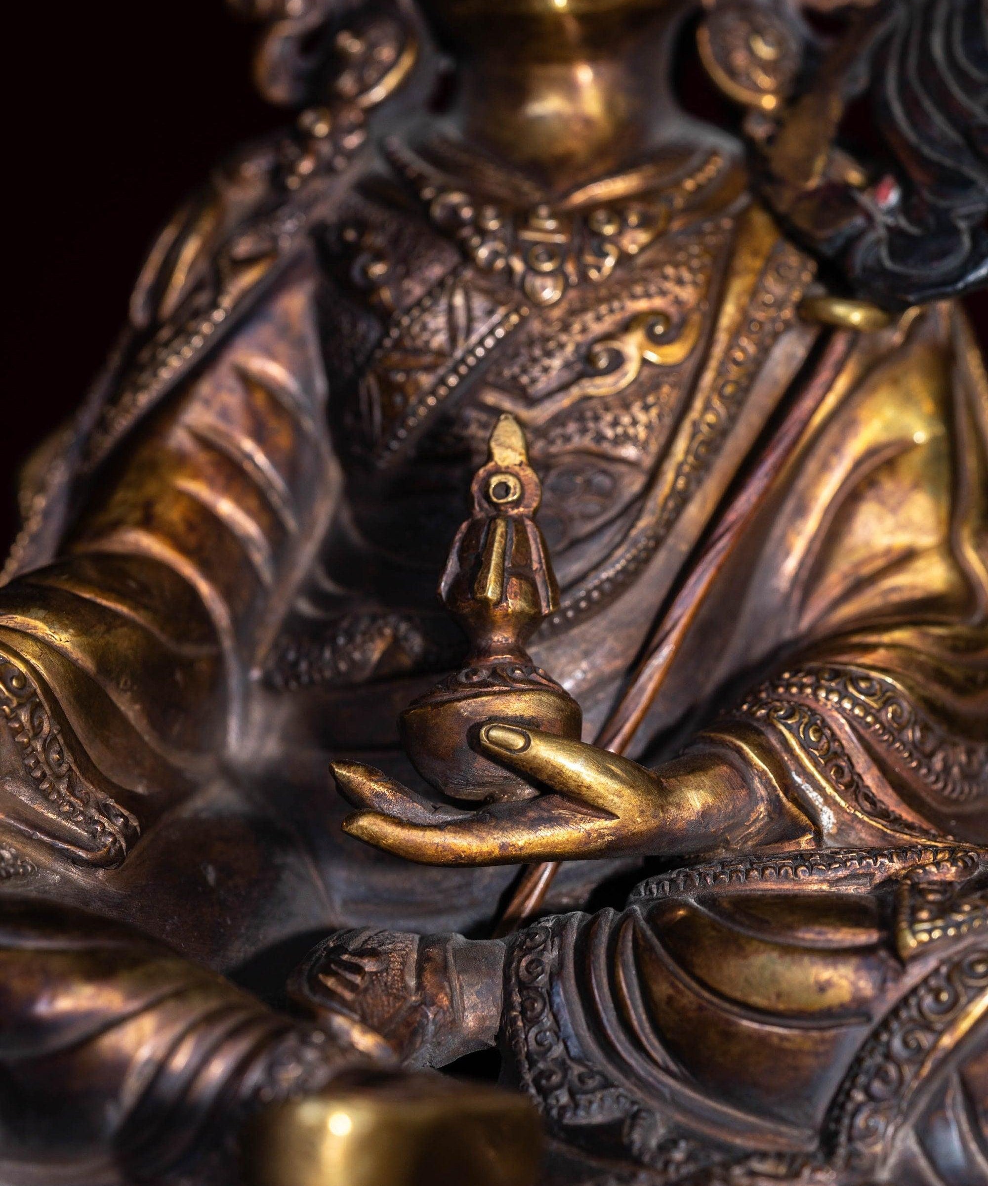 Guru Rinpoche statue metal craft from Nepal . Padmasambhava on lotus with bajra and skull cup