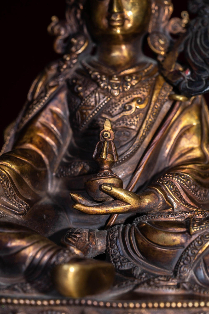 Guru Rinpoche statue metal craft from Nepal . Padmasambhava on lotus with bajra and skull cup