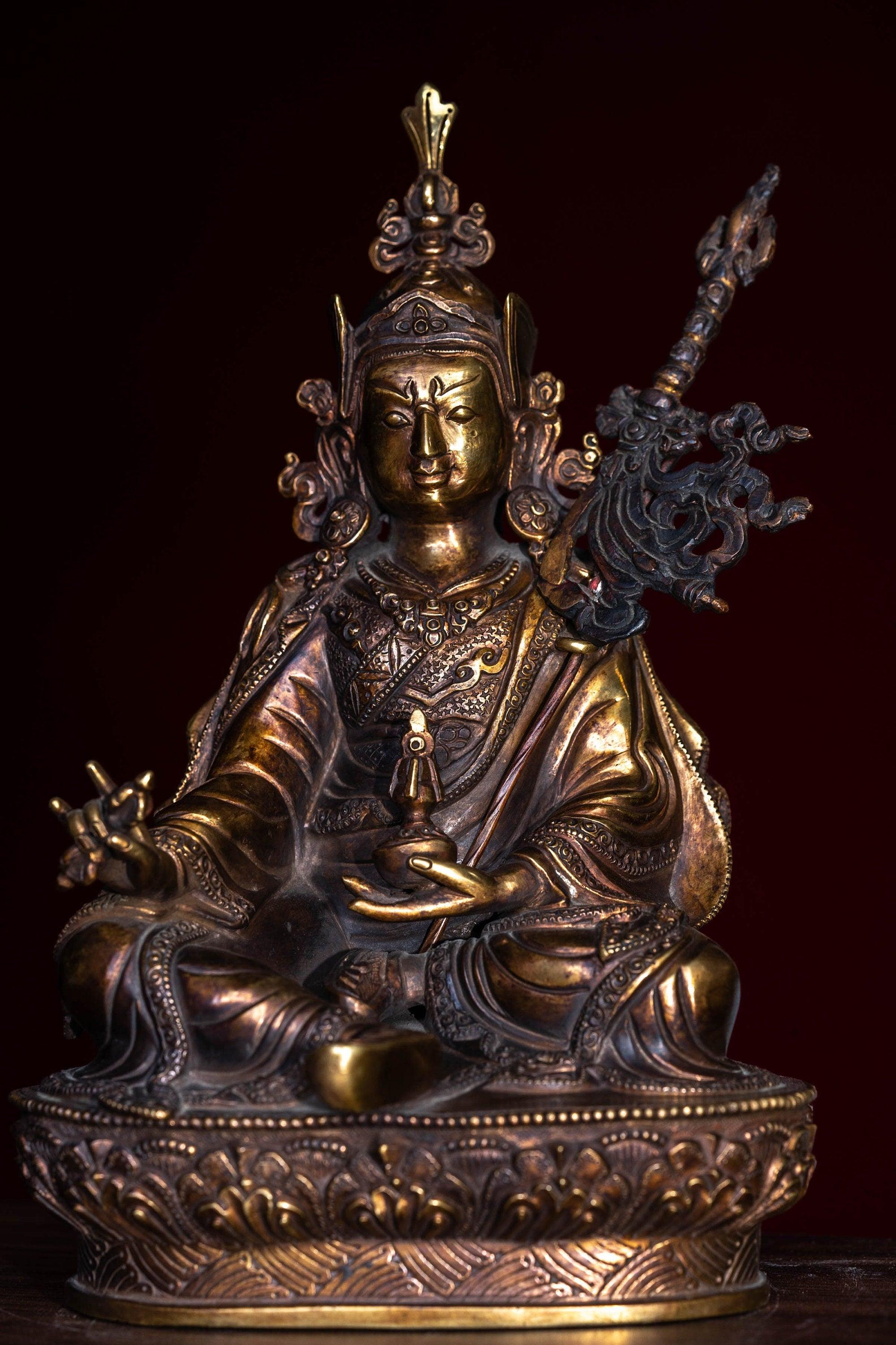 Guru Rinpoche statue metal craft from Nepal . Padmasambhava on lotus with bajra and skull cup