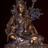 Guru Rinpoche statue metal craft from Nepal . Padmasambhava on lotus with bajra and skull cup 