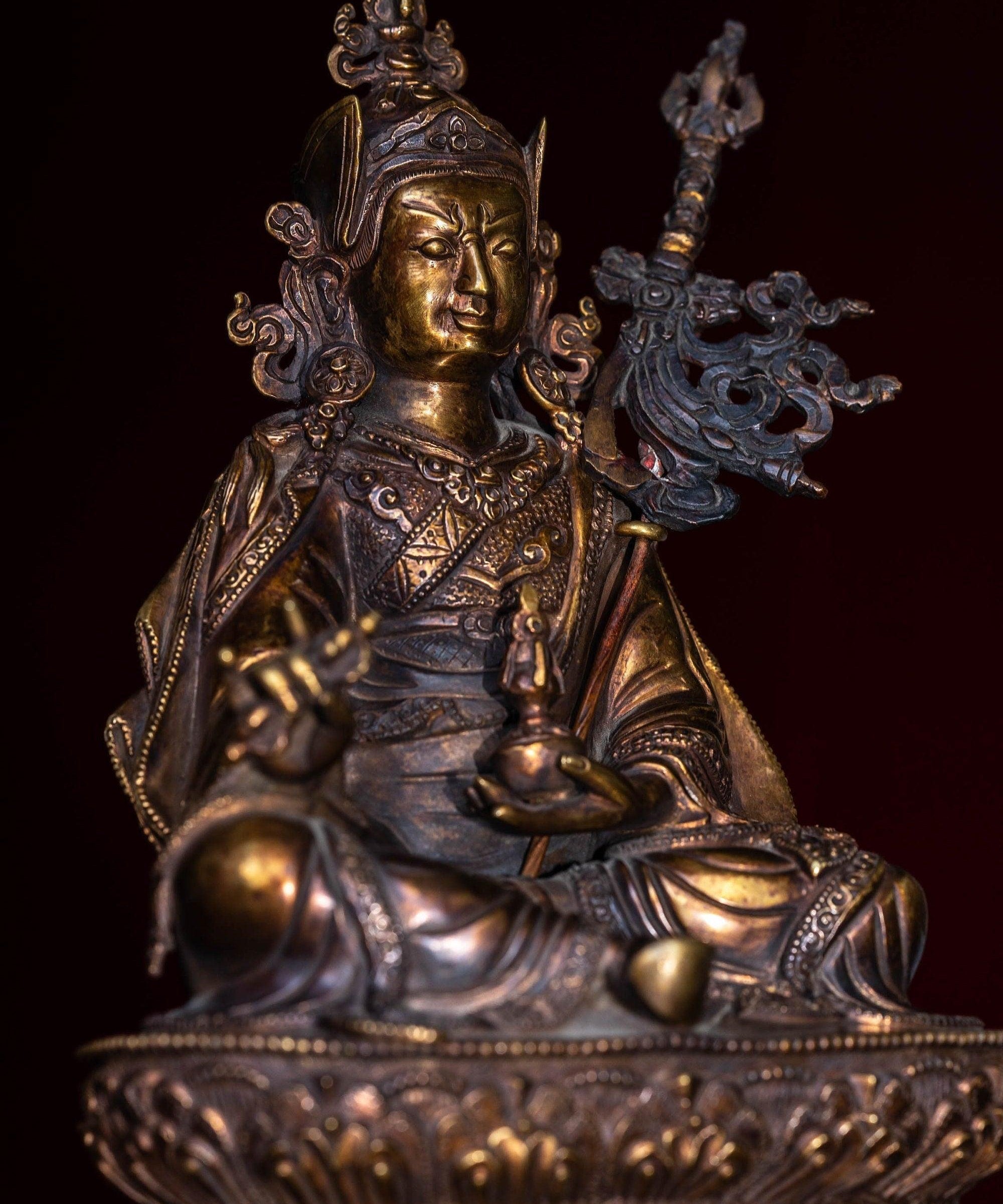 Guru Rinpoche statue metal craft from Nepal . Padmasambhava on lotus with bajra and skull cup 