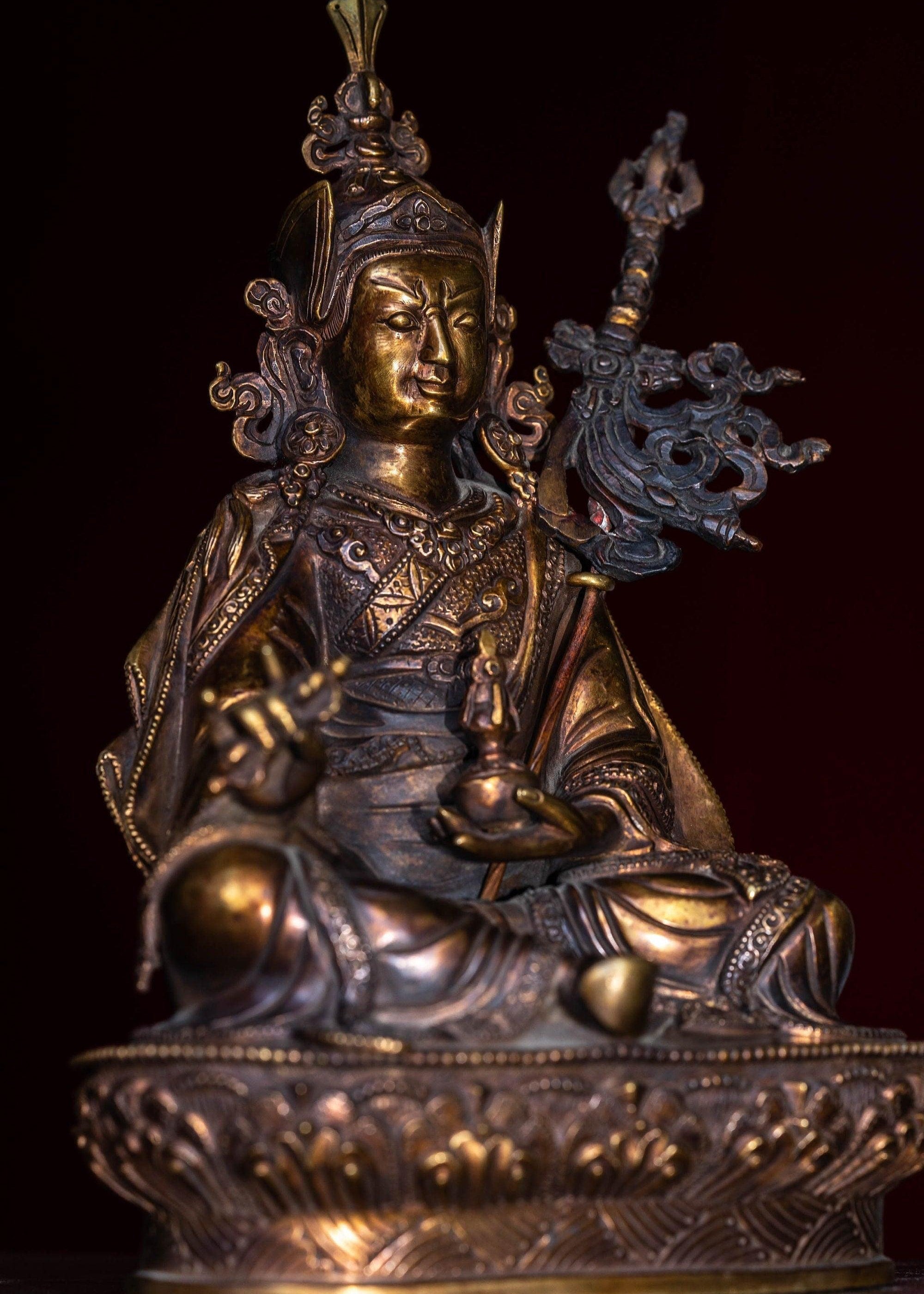 Guru Rinpoche statue metal craft from Nepal . Padmasambhava on lotus with bajra and skull cup 