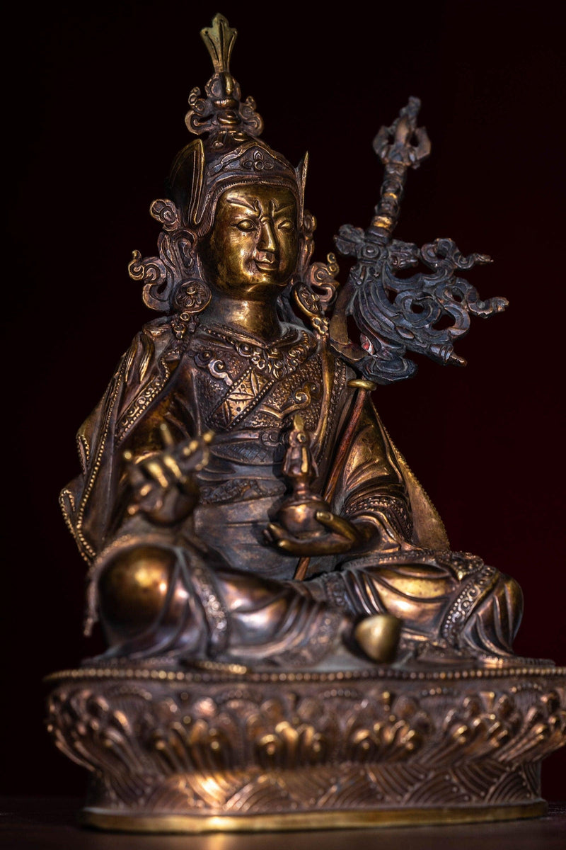 Guru Rinpoche statue metal craft from Nepal . Padmasambhava on lotus with bajra and skull cup 