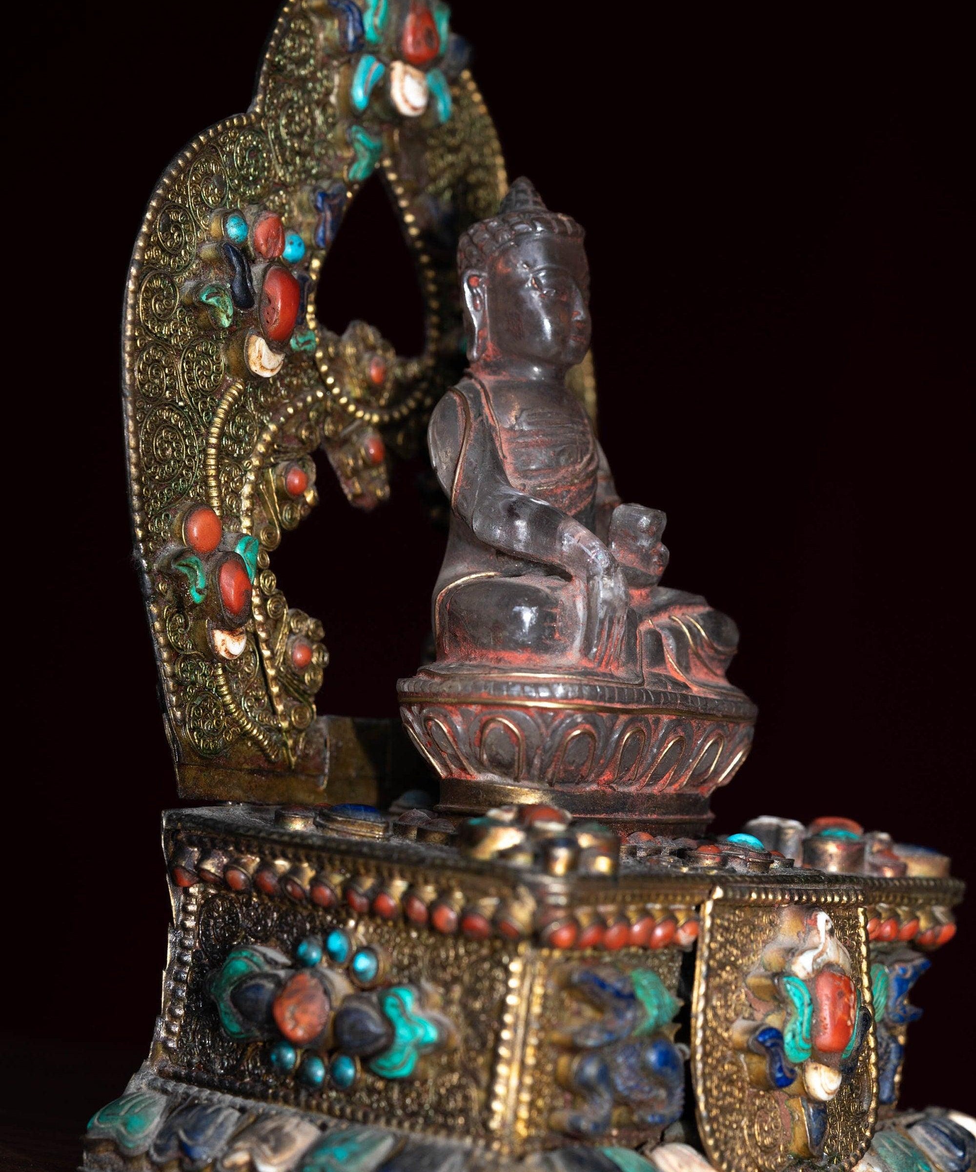 Crystal Statue of Buddha with Metal craft gold plated throne with ruby , turquoise and lapis