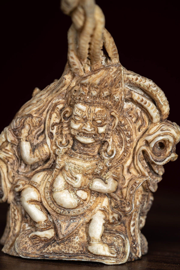 Two hand Mahakal bone statue with carving