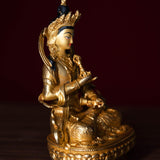 Vajrasattva holds the Vajra in his hand and seated on lotus. This is gold plated small size statue of Buddhist deity