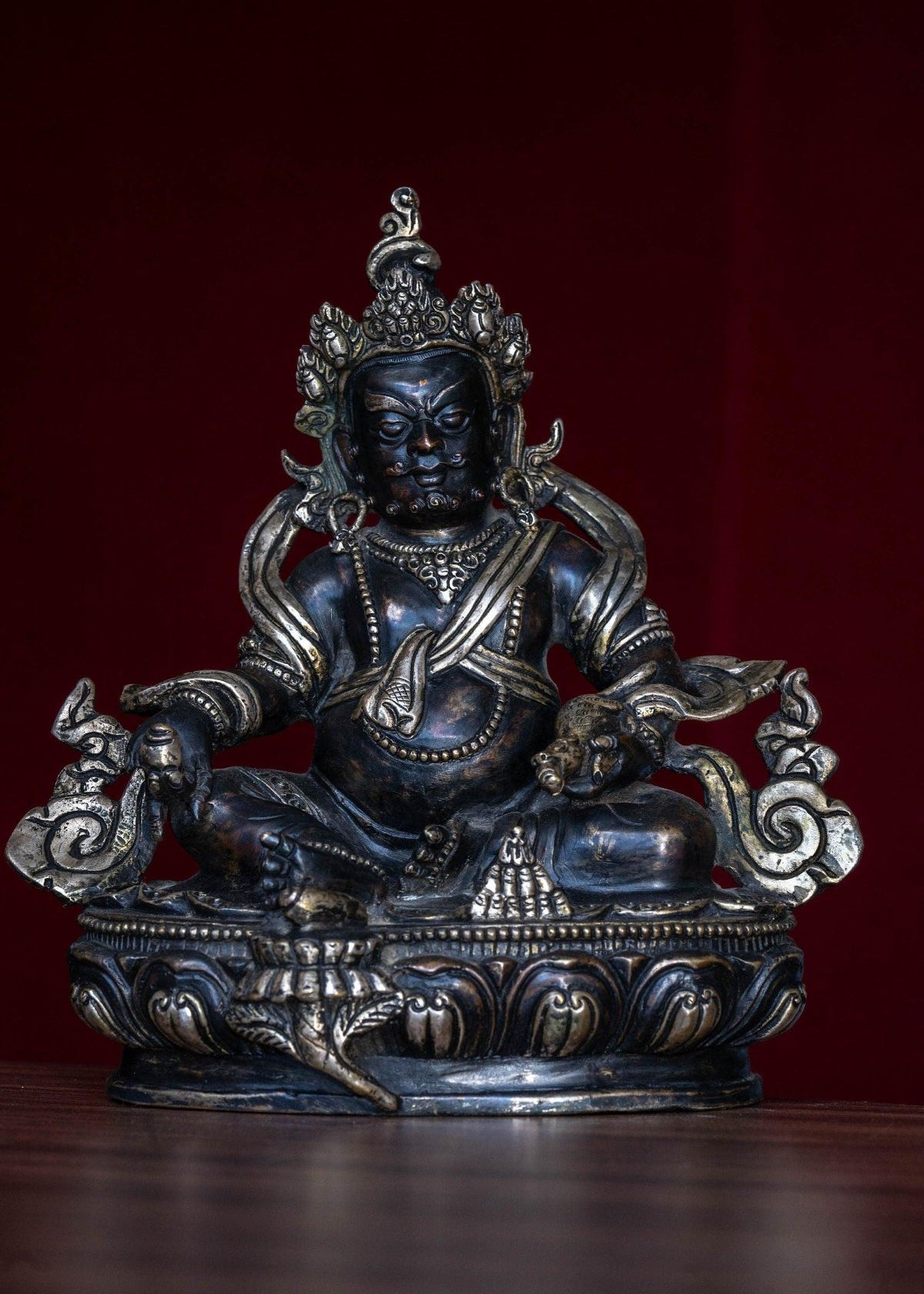 Handcrafted Zambala Statue.