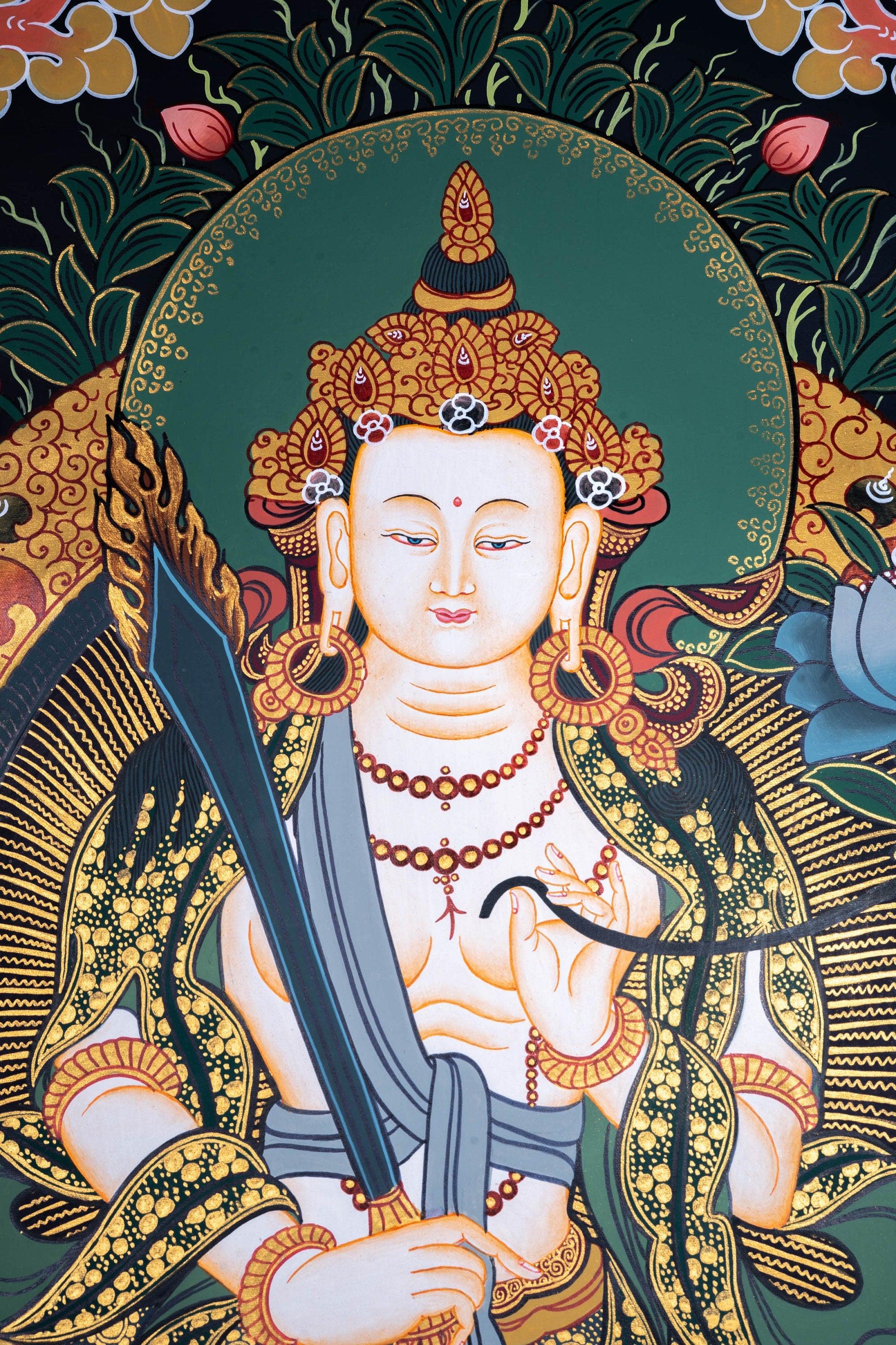 Manjushri Thangka painting in Chinese Art . Buddha of Wisdom and  cutting ignorance with his sword of flames.