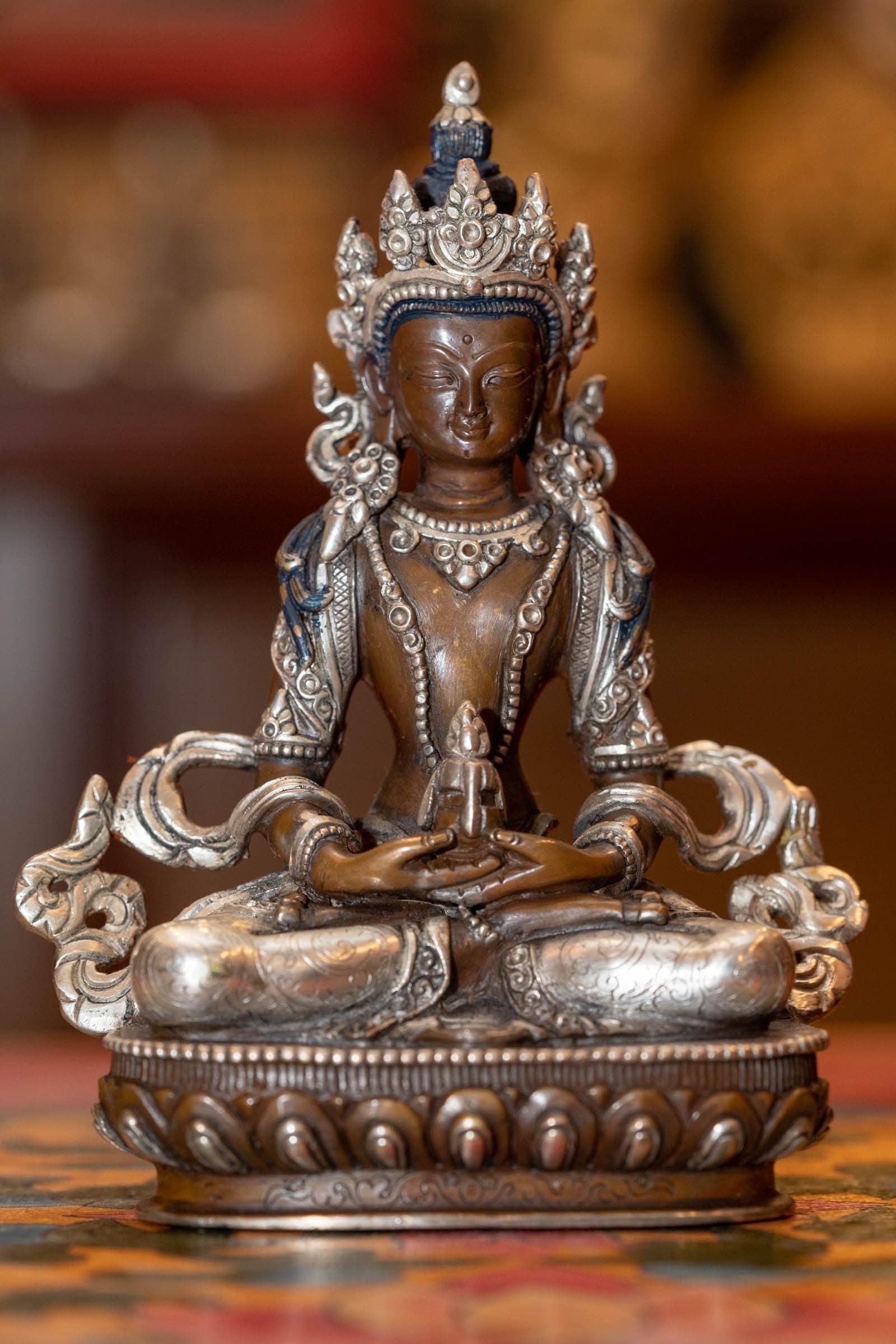 Vajrasattwa silver plated statue on bronze is handcrafted by local artesian from Nepal