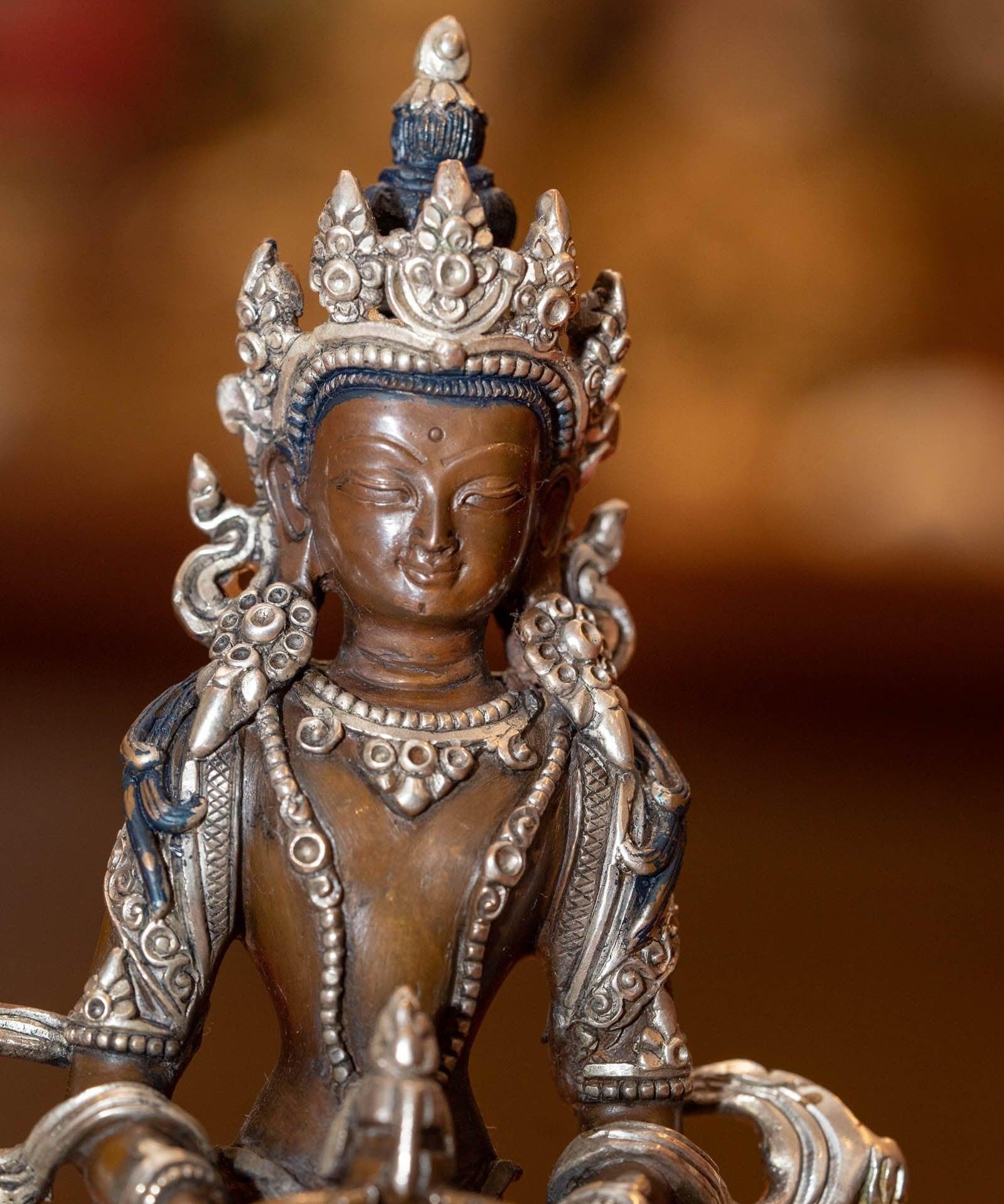 Vajrasattwa silver plated statue on bronze is handcrafted by local artesian from Nepal