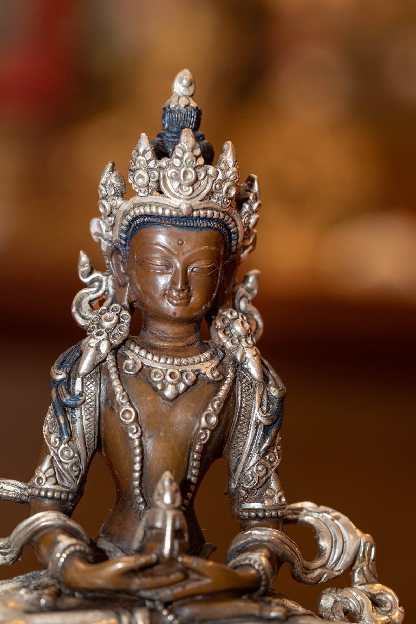 Vajrasattwa silver plated statue on bronze is handcrafted by local artesian from Nepal